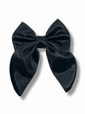 Svart hårspänne med rosett i satin