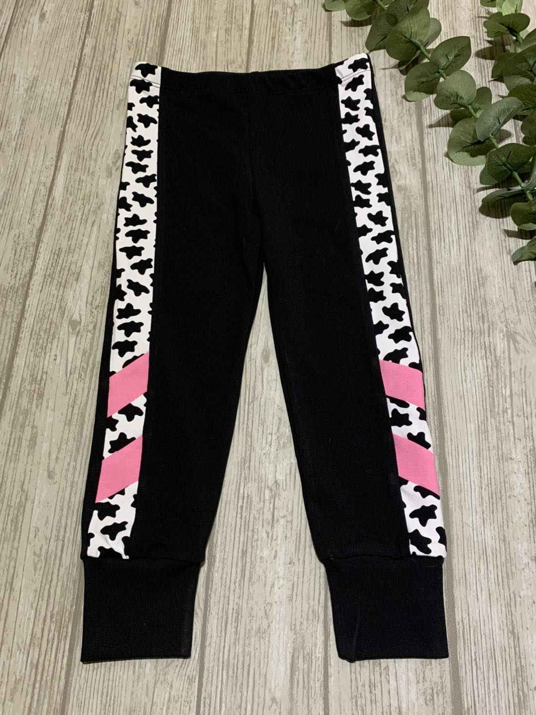 Svarta med sidrand muddbyxor