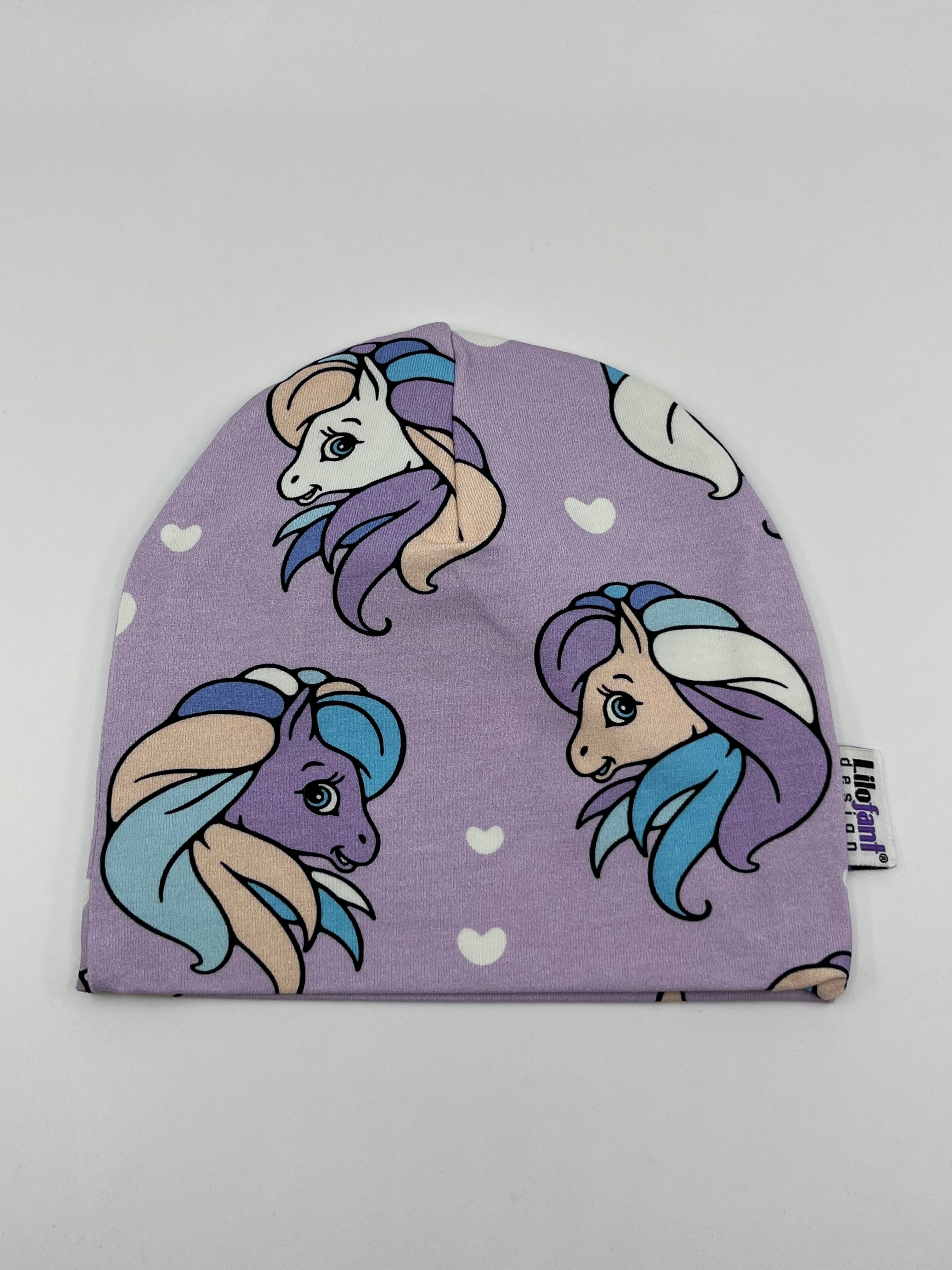 Lila ponies mössa
