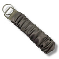 ljus taupe scrunchie nyckelring