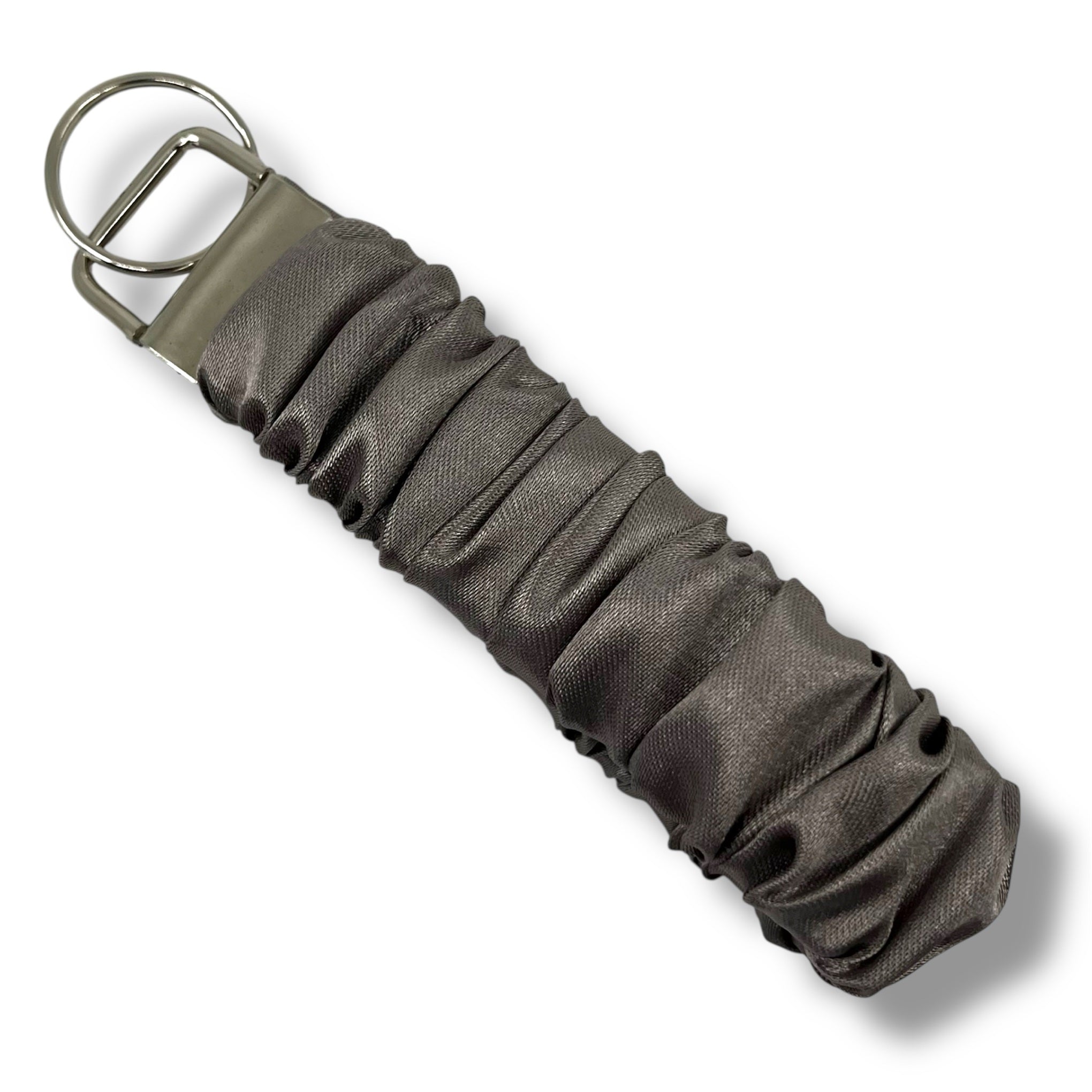 ljus taupe scrunchie nyckelring