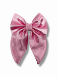 Ljusrosa hårspänne med rosett i satin