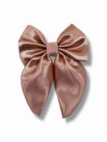 Gammelrosa hårspänne med rosett i satin