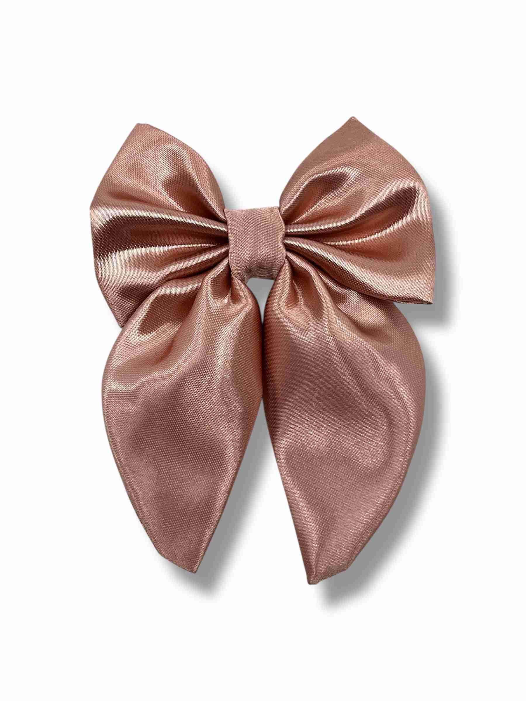 Gammelrosa hårspänne med rosett i satin