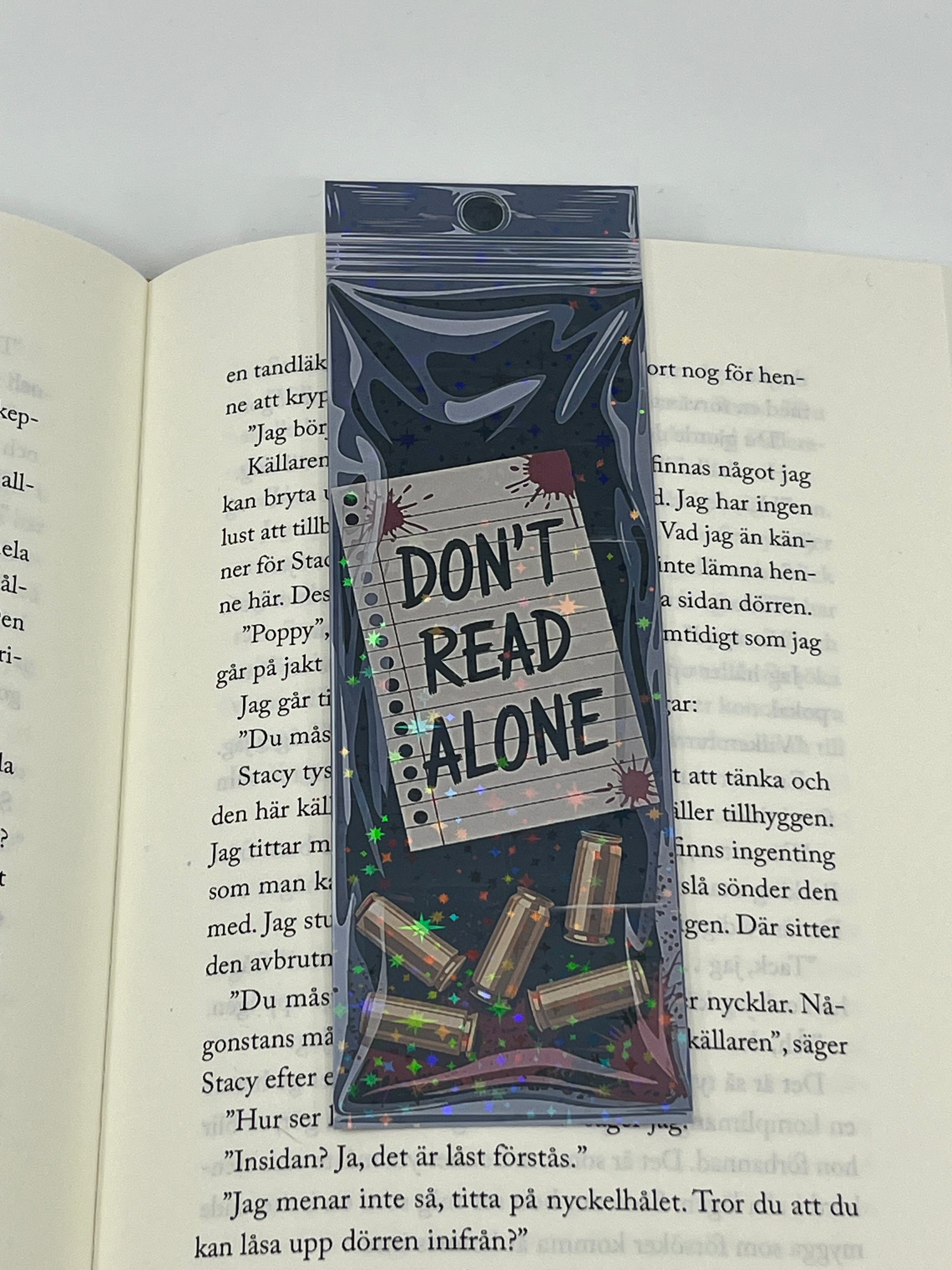 Don't read alone bokmärke