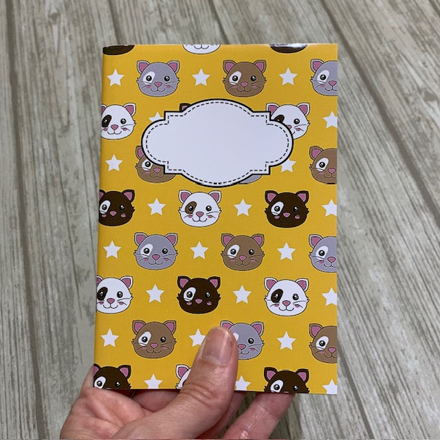 Solgul katter - anteckningsbok A5